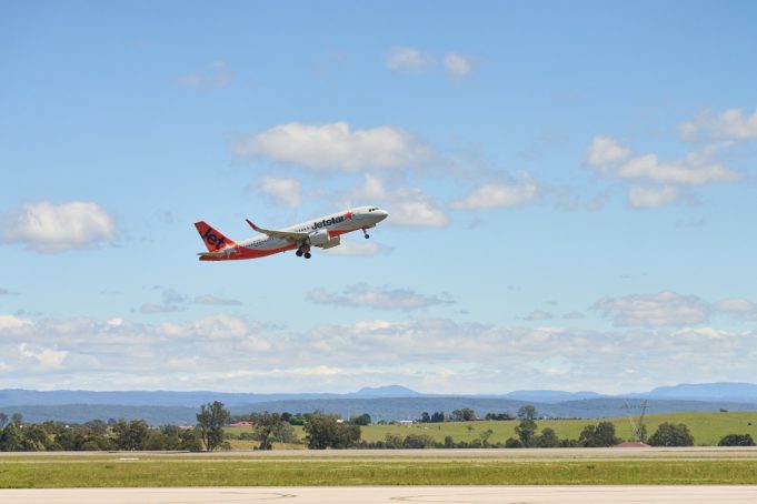 Western Sydney takes flight as first plane leaves from new airport